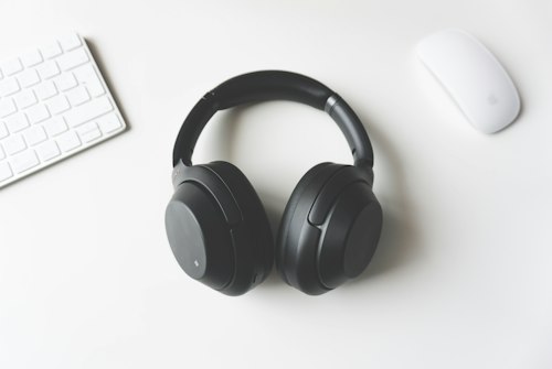 Black over-ear headphones on a sample brand product page